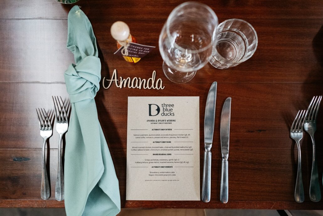 Table setting for wedding with name plate and menu