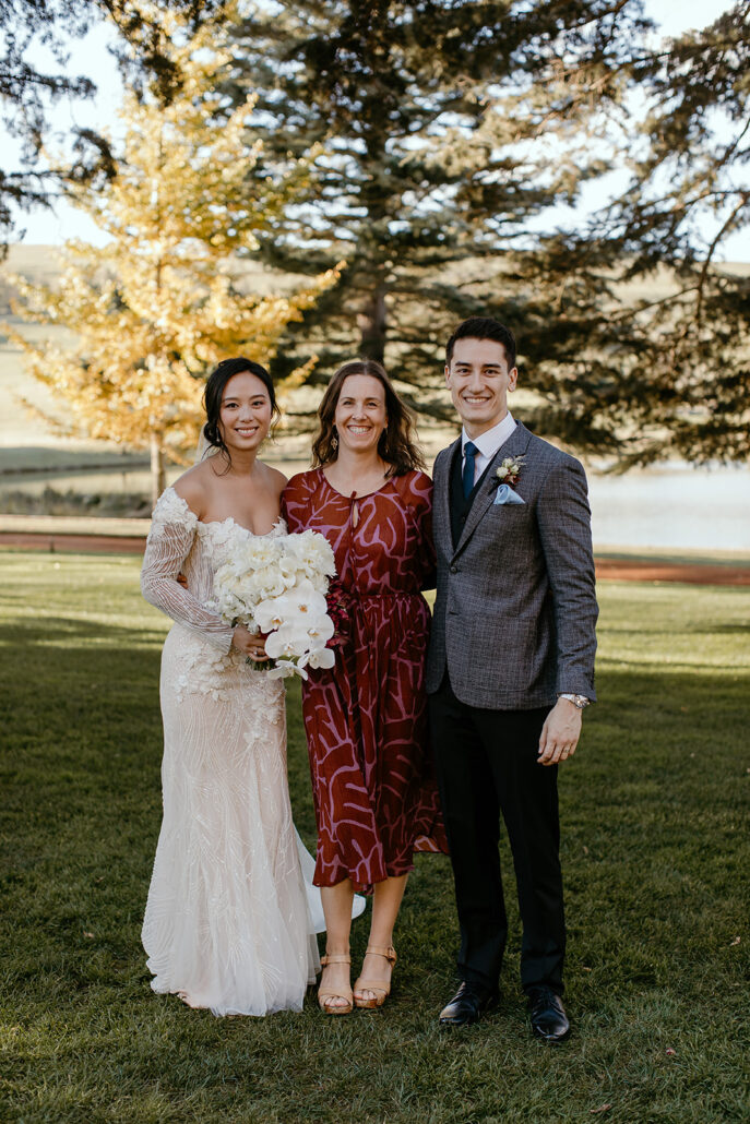 Newlywed couple with celebrant Andrea Calodolce