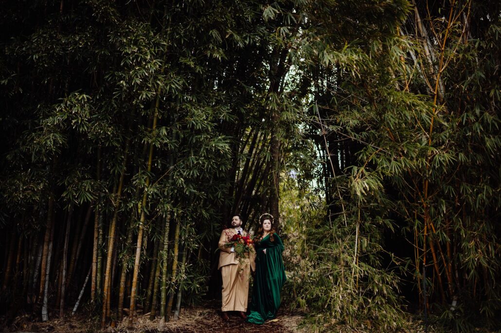 Couple posing in bamboo garden