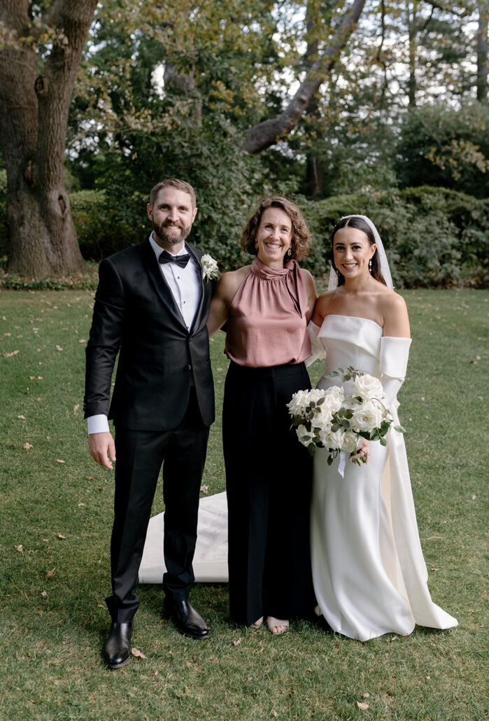 Bride and groom with marriage celebrant Andrea Calodolce